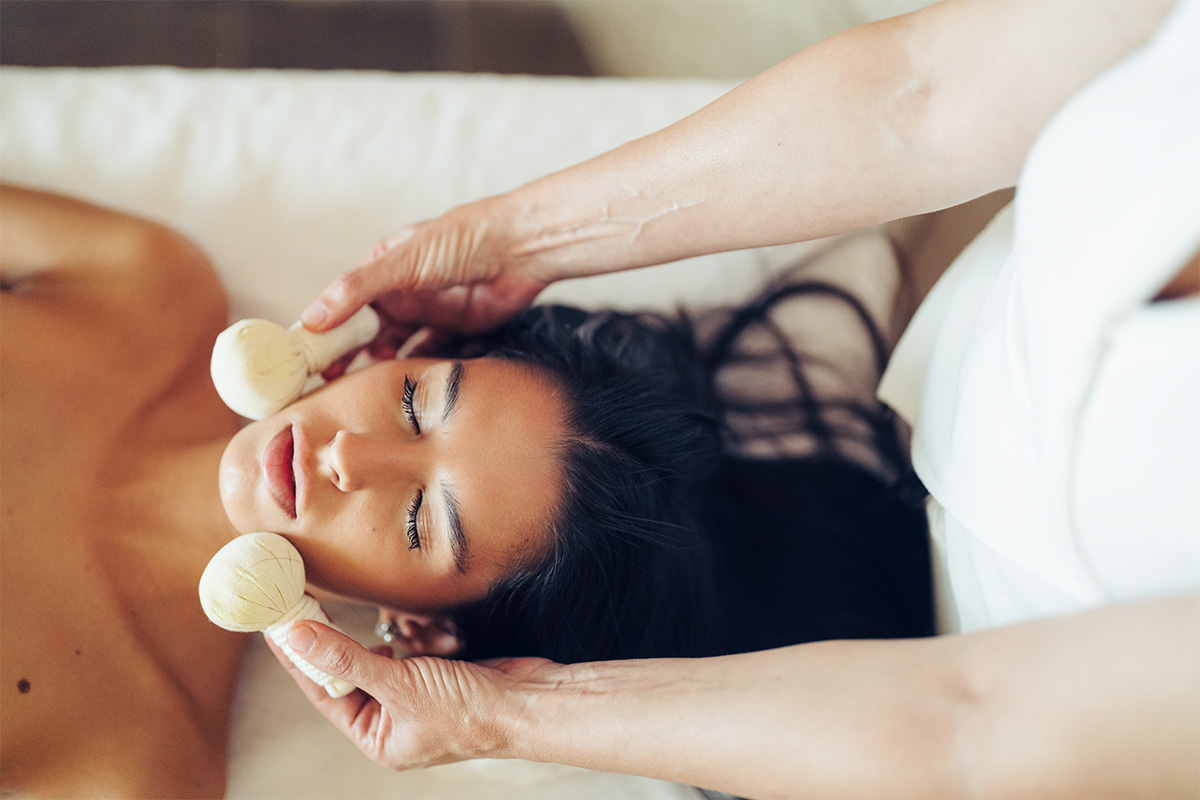 Facial massage in the hotel spa.