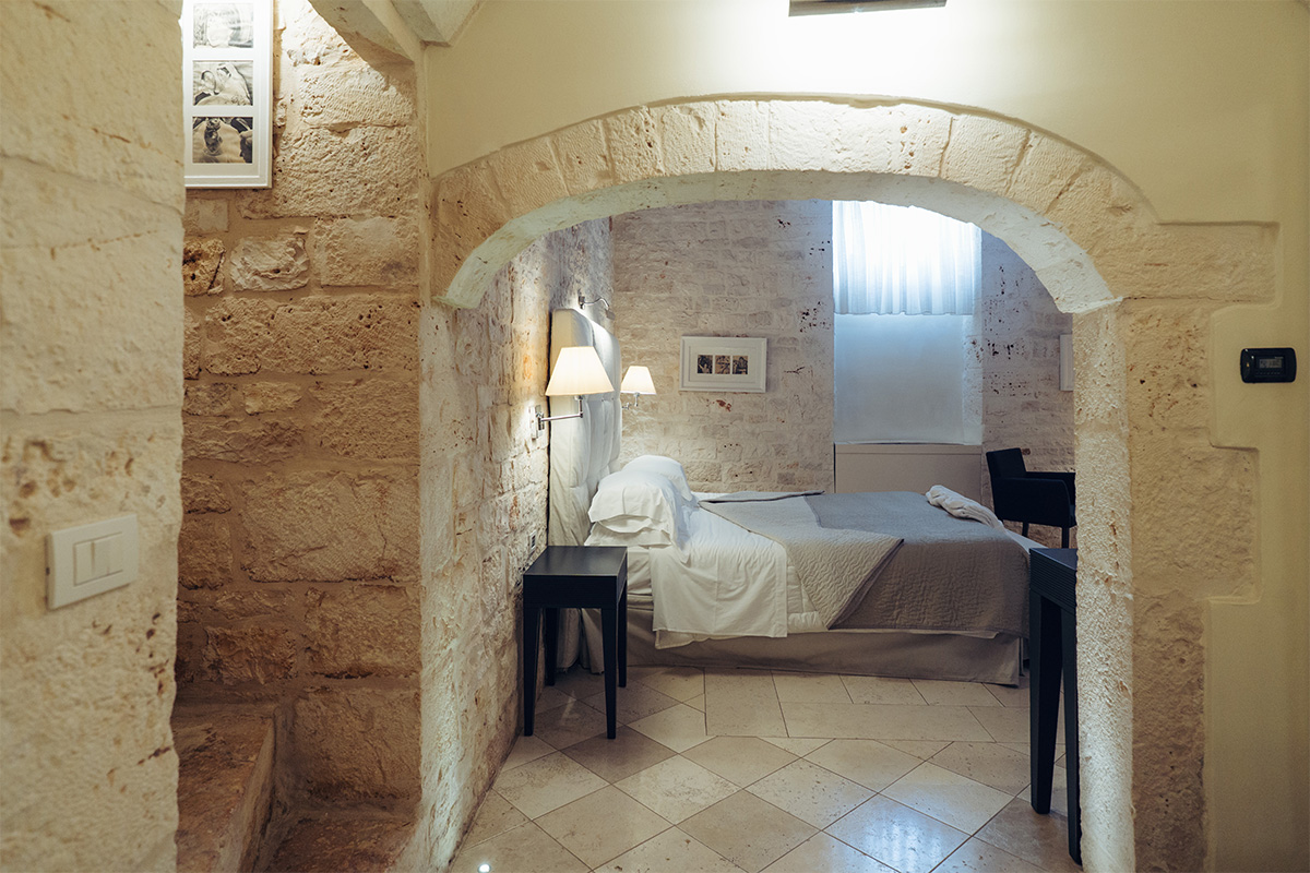 A stone room at the Il Santissimo hotel relais to accommodate wedding or event guests.